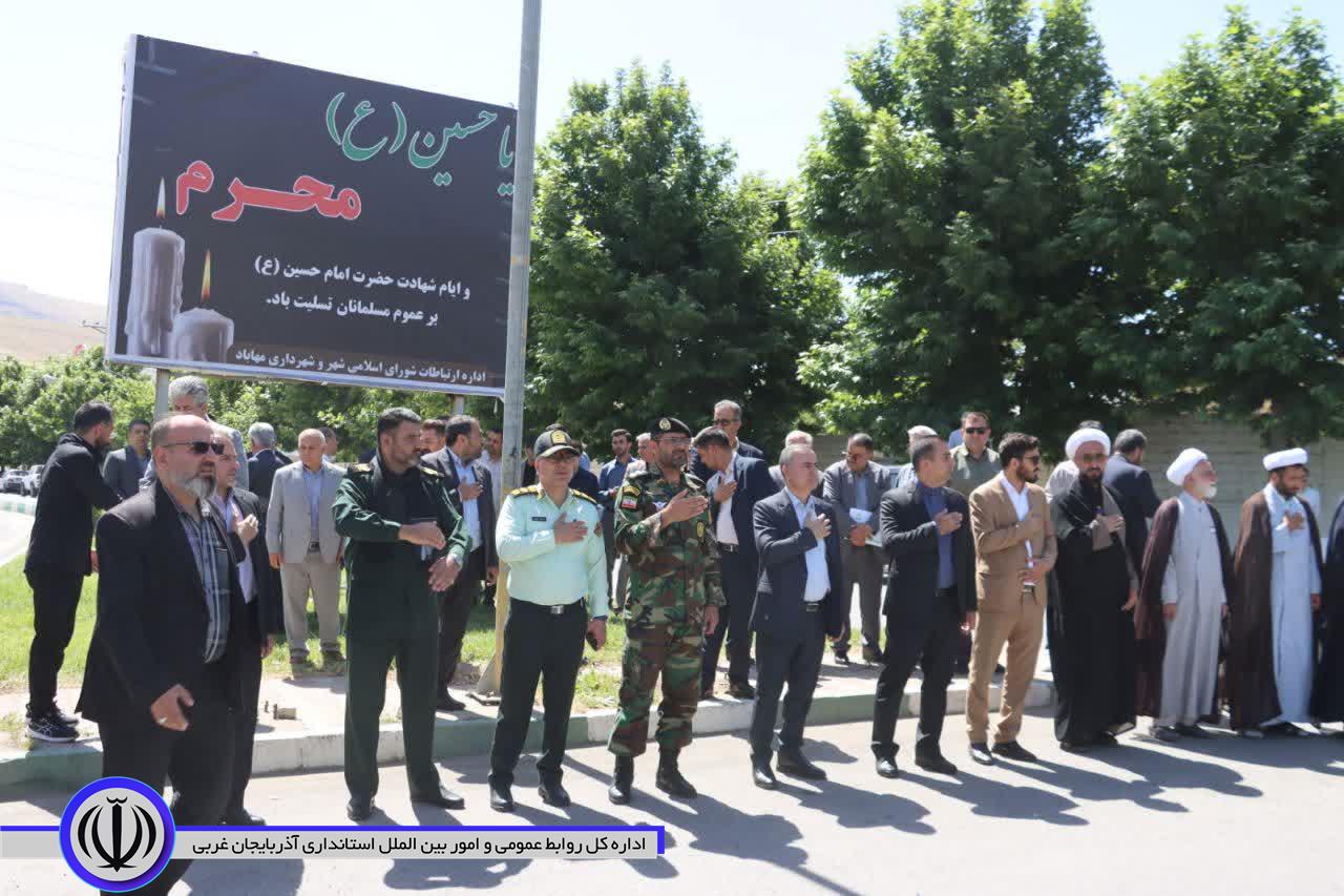 طنین «هیهات من الذله» در مهاباد در آیین سنتی علمبندی ماه محرم